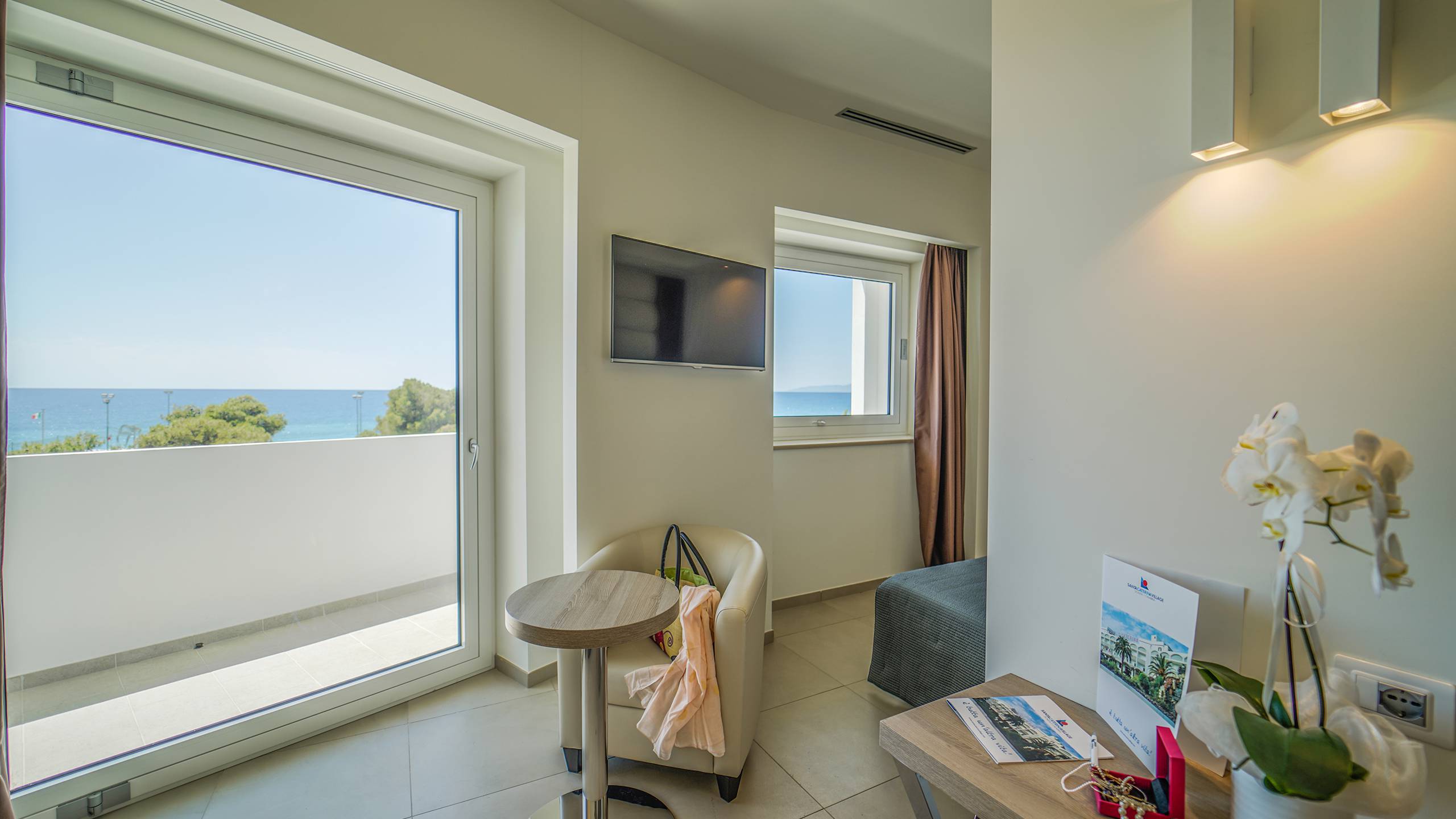 Santa-Caterina-Village-Scalea-junior-suite-living-room-window-DSC09040